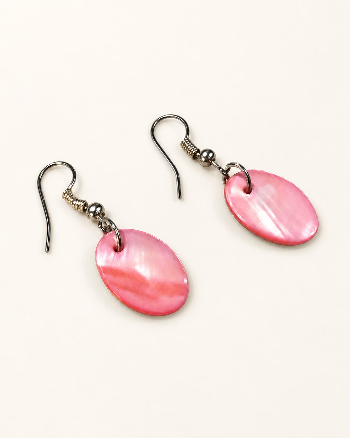 "Pretty in Pink" Oval Shaped Shell Earrings — AI-restyled studio presentation based on the original product photograph