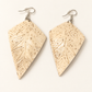 Cream Coconut Shell Earrings — AI-restyled studio presentation based on the original product photograph