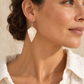 Cream Coconut Shell Earrings worn by a model - AI-assisted styling illustration; scale is illustrative. Original product photographs are included in the gallery.
