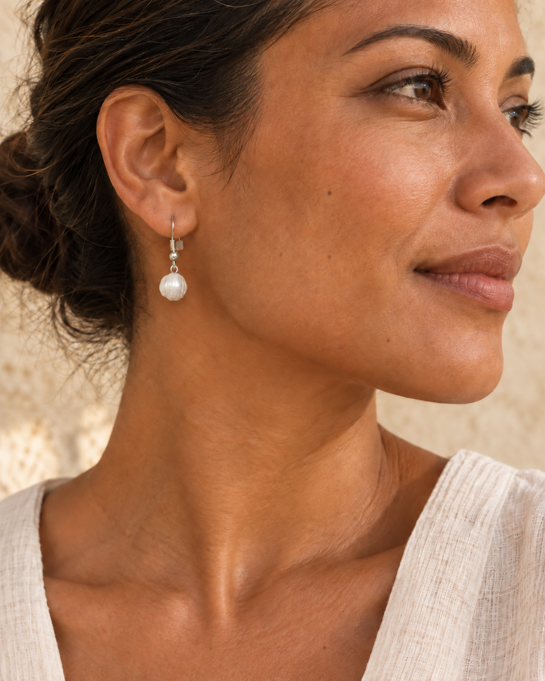 AI-generated styling illustration of Cultured Baroque Pearl Earrings; jewellery shown at smaller proportions. Refer to original product photographs for construction and measurements.