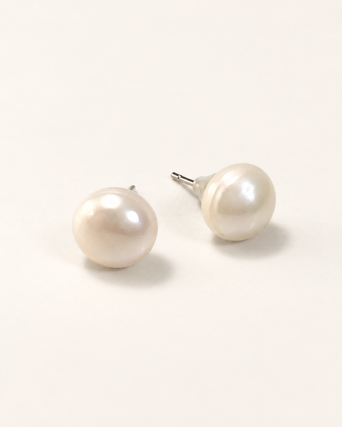 Cultured Mabe Pearl Earrings — AI-restyled studio presentation based on the original product photograph