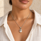 AI-generated styling illustration of Cultured White Baroque Pearl Necklace; jewellery shown at smaller proportions. Refer to original product photographs for construction and measurements.