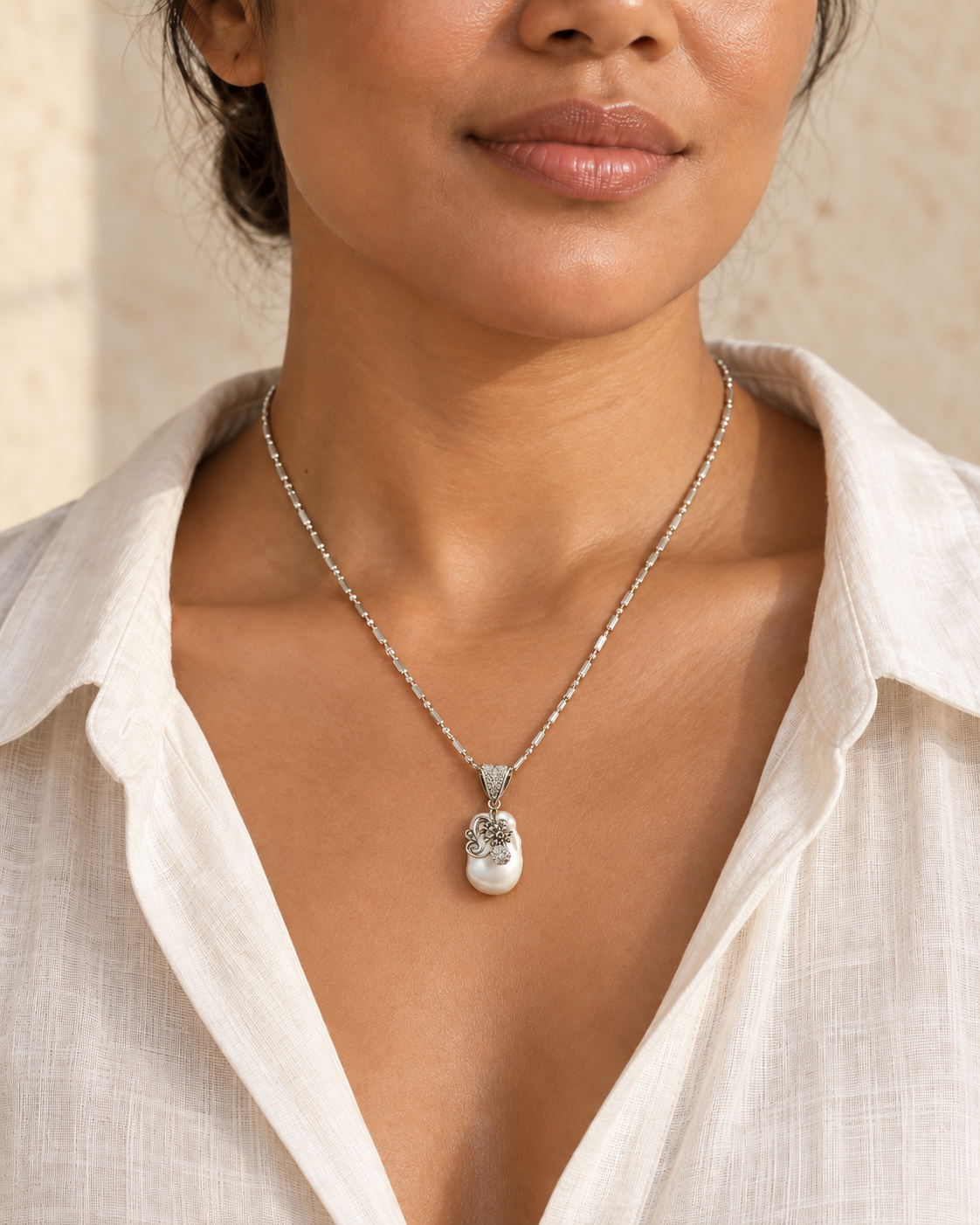 AI-generated styling illustration of Cultured White Baroque Pearl Necklace; jewellery shown at smaller proportions. Refer to original product photographs for construction and measurements.