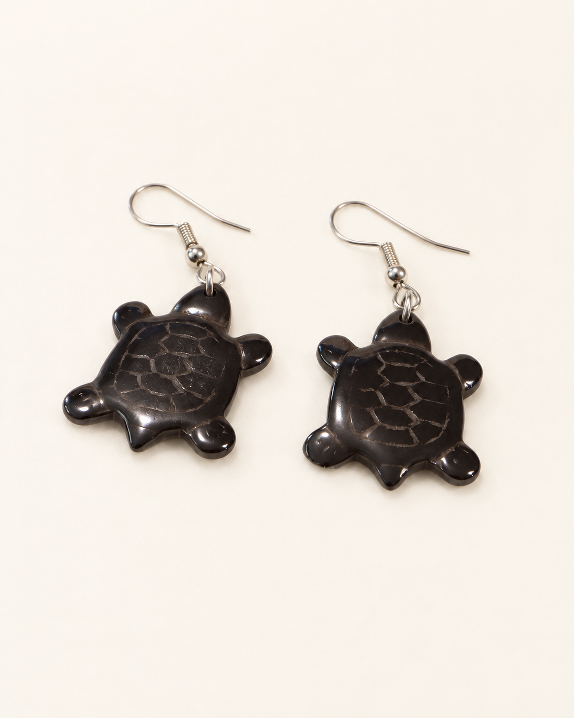 Deep Sea Stone Carved Turtle Earrings — AI-restyled studio presentation based on the original product photograph