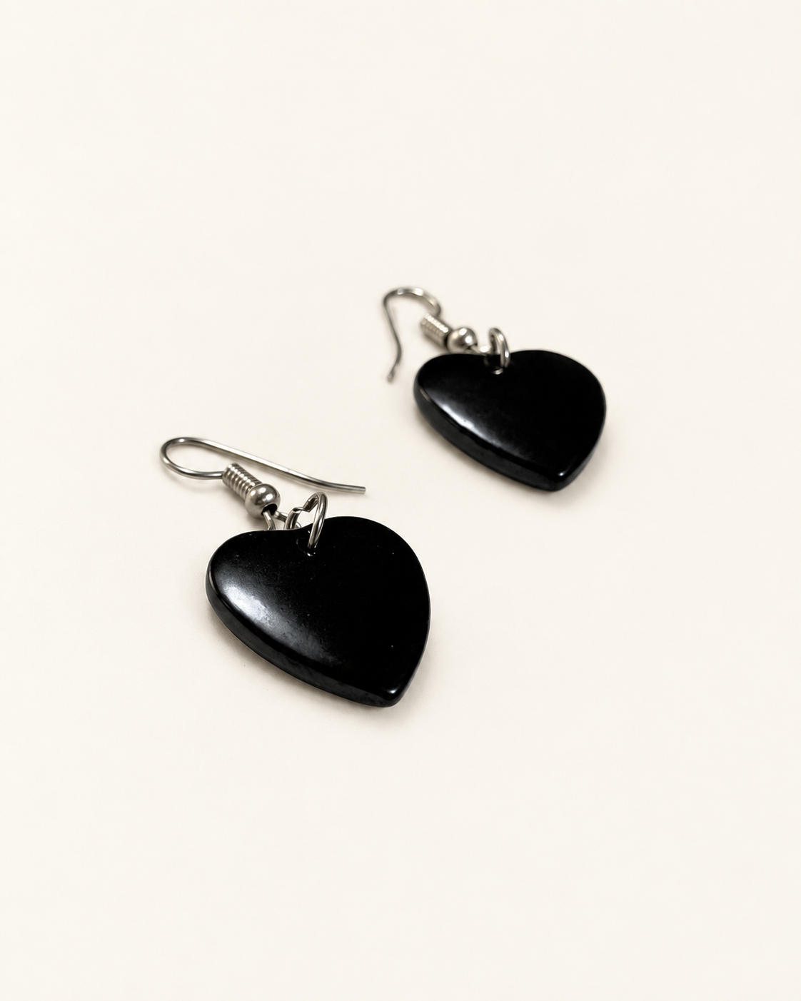 Deep Sea Stone Heart-Shaped Earrings — AI-restyled studio presentation based on the original product photograph