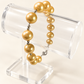 Golden South Sea Cultured  Pearl Bracelet 7-9mm — AI-restyled studio presentation based on the original product photograph