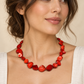 Red Shell Necklace — AI-generated model styling; scale illustrative