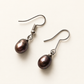 South Sea Cultured Black Pearl Earrings (7mm) — AI-restyled studio presentation based on the original product photograph