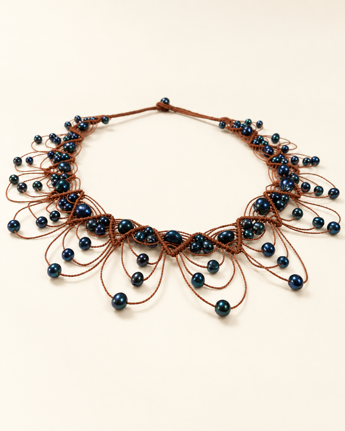 Tongan Cultured Black Pearls Woven Necklace — AI-restyled studio presentation based on the original product photograph